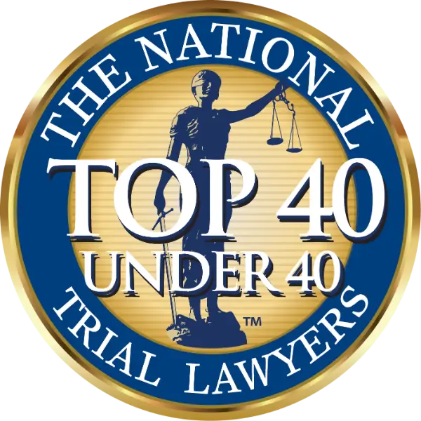 The Law Office of Bryce Carpenter 17 The National Trial Lawyers Top 40 Under 40 award badge with Lady Justice emblem